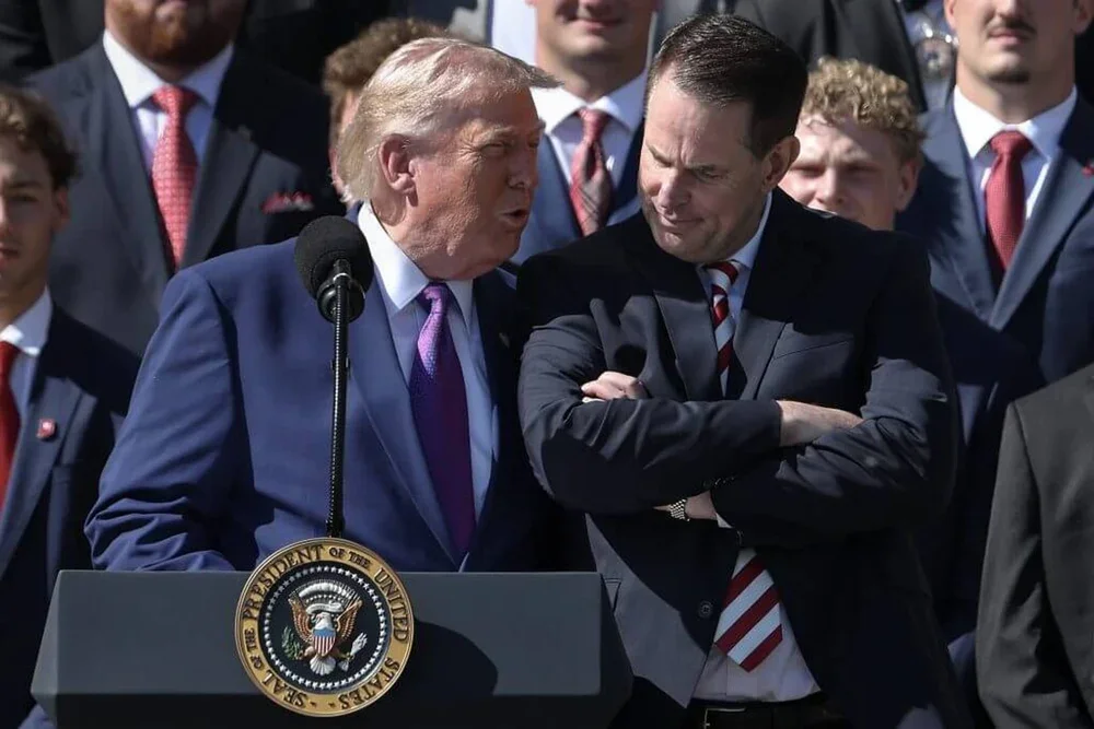 U.S. President Donald Trump jokes with Indiana coach Curt Cignetti during an event to celebrate the national champion Hoosiers on Monday.